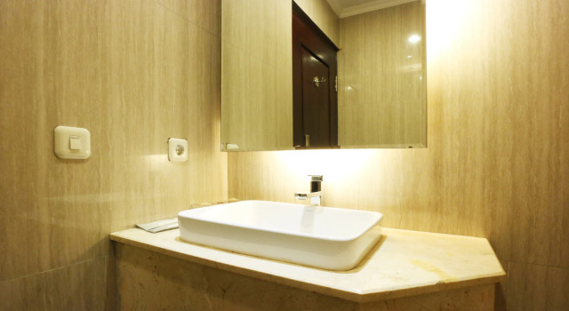 Номер Deluxe Coins Hotel Jakarta