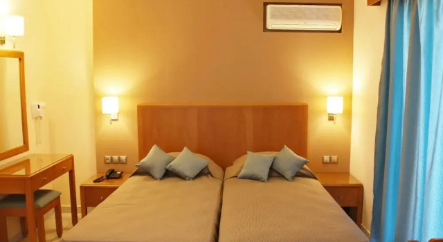 Студия Deluxe Sandy's Studios Apartments & Log Villas