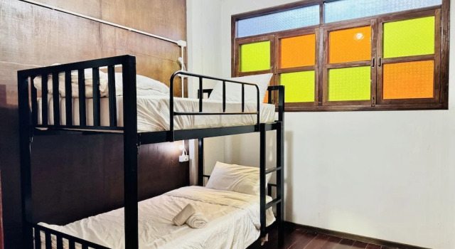 Кровать в общем номере Collection O Bupamontra Chiangmai