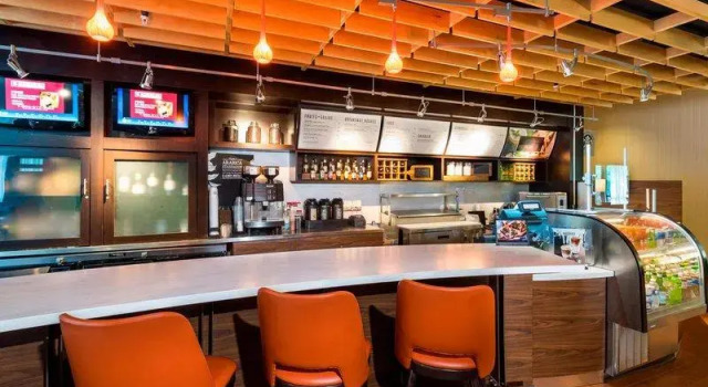 Кровать в общем номере Courtyard by Marriott Atlanta Buford Mall of Georgia