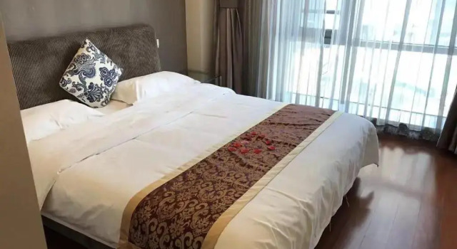 Апартаменты Jiu Du Hui Apartment And Hotel