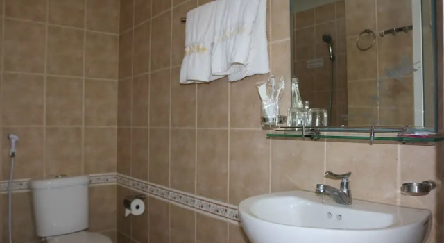 Четырёхместный семейный номер Standard с видом на сад Sunrise Village Hotel