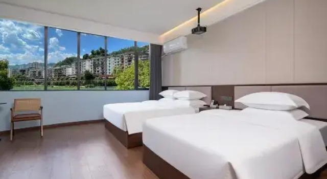 Shangan Homestay, Prenota Hotel Hotel a Enshi Prefecture con parcheggio, Parcheggio