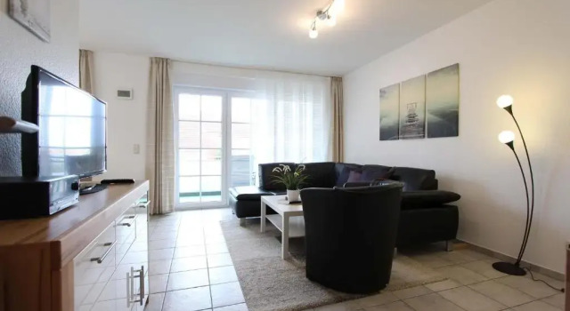 Haus Strandblick Whg 4 1 OG li, Забронировать Отель Отели Келленхузен с парковкой, Парковка