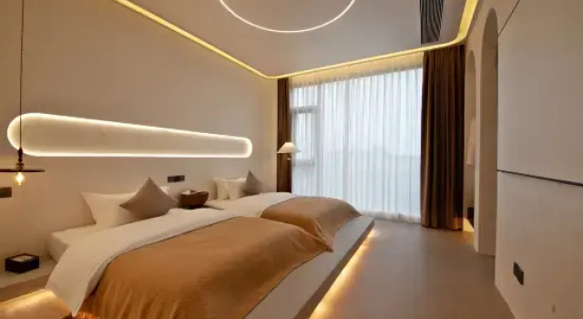 Qujing Xiaohuayuan Yiju Homestay, Prenota Hotel Qujing Yunnan