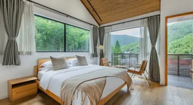 Кровать в общем номере Juesu Hot Spring Hostel