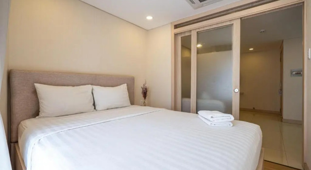 Апартаменты Deluxe с балконом Express by M Village Nguyễn Bỉnh Khiêm, a brand of Modern Village Lifestyle