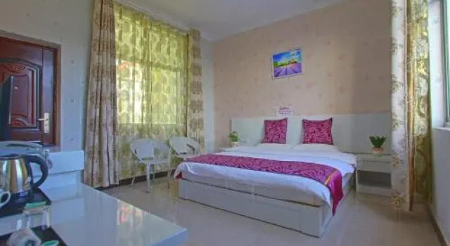 Lijiang Yi Jia Hostel by the Airport, Prenota Ostello Lijiang Yunnan