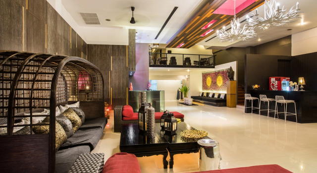 Кровать в общем номере The Small Chiang Mai Hotel