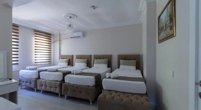 Четырёхместный номер Standard Modena Hotel