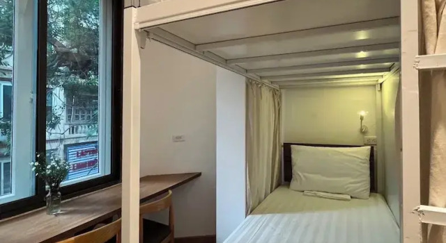 Кровать в общем номере с видом на город Urban Slumber Hostel