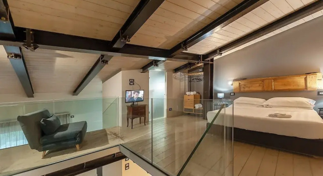 Junior suite 1 camera da letto con vista sul giardino Anfihouse - Assisi Relais