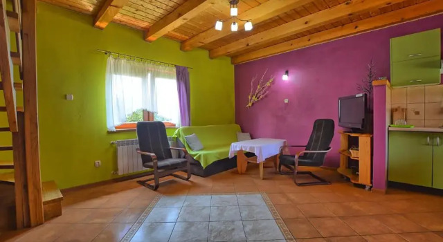 Апартаменты Całoroczne domki apartamentowe "Pod lipą" Izabela Konopelska