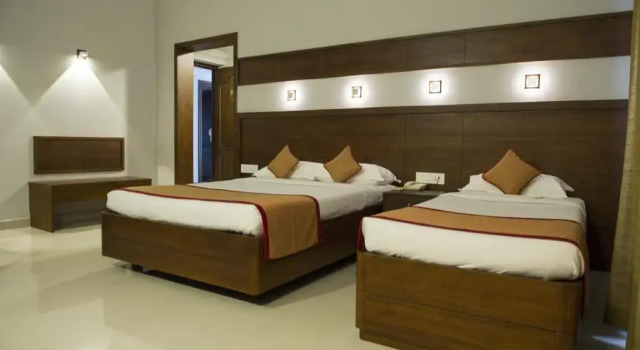 Трёхместный номер Deluxe Bhasuri Inn Guruvayoor