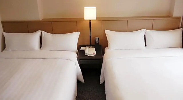 Четырёхместный номер Deluxe Guide Hotel Taipei Chongqing