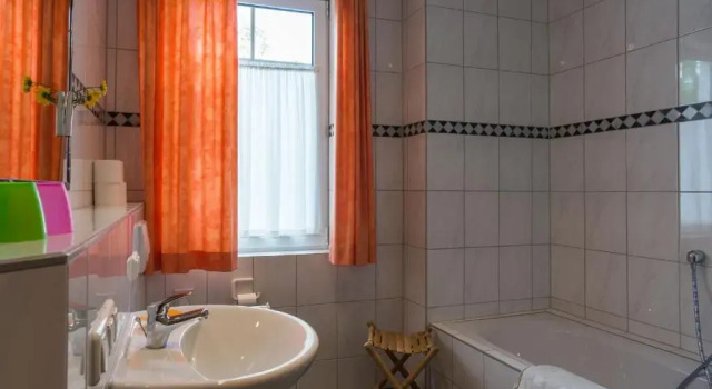 Апартаменты Ferienhaus - Strandstr. 24