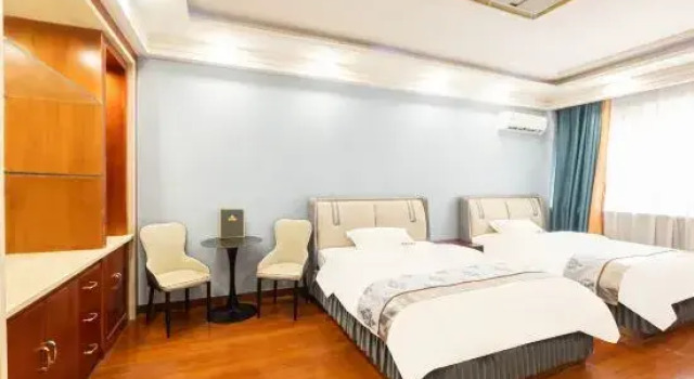 Suite Kuqa Xinyu Hotel (Guiz Plaza)