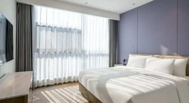 Семейный люкс Tong Run Hotel
