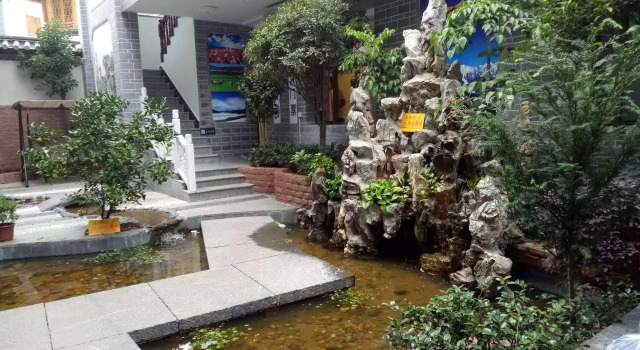 7Days Inn Old Town of Lijiang The Grand Water Wheel, Забронировать Отель Недорогие отели Лицзян, рядом с Улица Сквер-стрит Древнего города Даянь, недорого