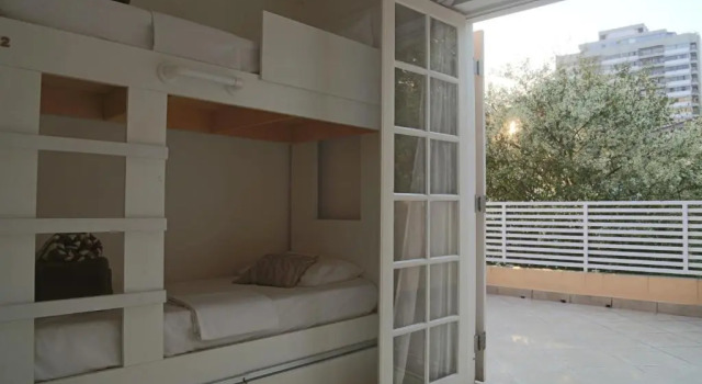 Кровать в общем номере Villa Hostel