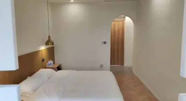 Двухместный люкс Yichang Nayun Homestay (Three Gorges Dam Tourist Area)