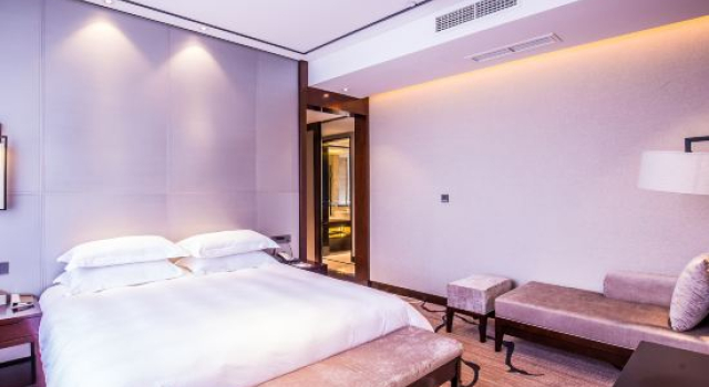 O podwyższonym standardzie suite Red Sun Hotel Wenzhou