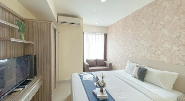 Modern and Homey 1BR without Living Room at Grand Kamala Lagoon Apartment By Travelio, Book Apartment Bekasi West Java