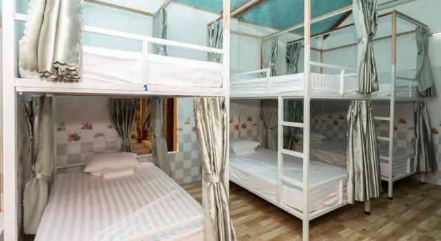 Кровать в общем номере Tam Coc mountain bungalow