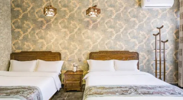 Кровать в общем номере Badaling Chadao Guxuan Homestay