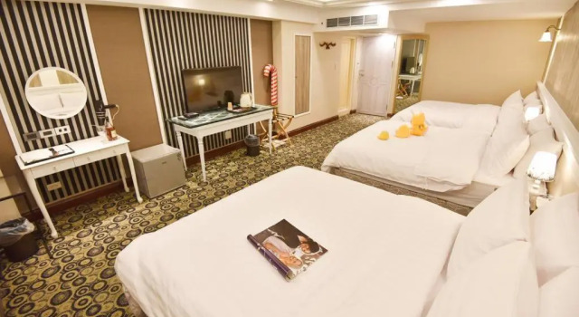Семейный номер Deluxe Mi Ge Business Hotel