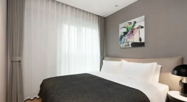 Люкс Deluxe с 2 комнатами Chengdu Gausmann Service Apartment