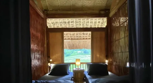 Кровать в общем номере Tớ Dày Du Già Village