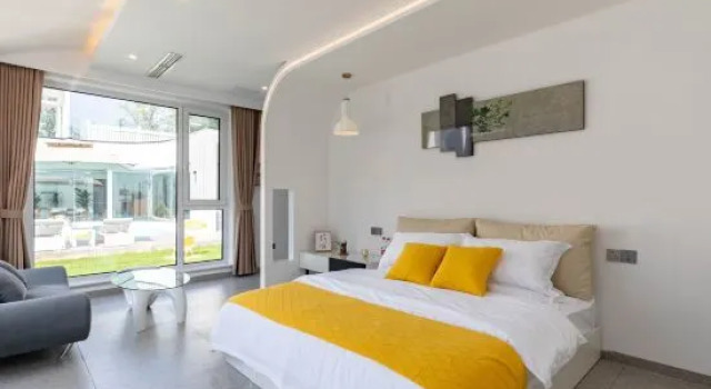 Кровать в общем номере Yujian Homestay (Badaling Branch)
