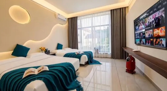 Семейный люкс с 2 комнатами ZK Hotel (yizhuangjingjikaifaquMaqiqiao Branch)