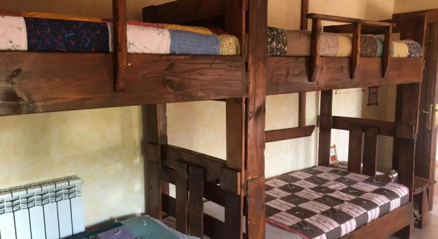 Кровать в общем номере Machanents Guest House