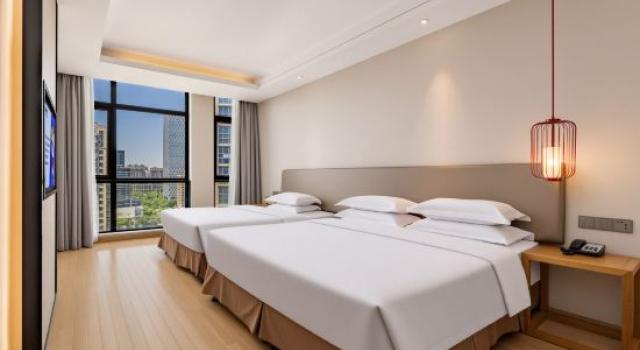 Семейный люкс Kaiyuan Manju Hotel (Yinzhou Wanda Plaza Ningbo Railway Station Branch)