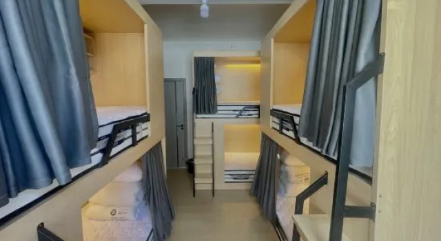 Кровать в общем номере (мужской номер) Mangshi Lilian Youth Hostel
