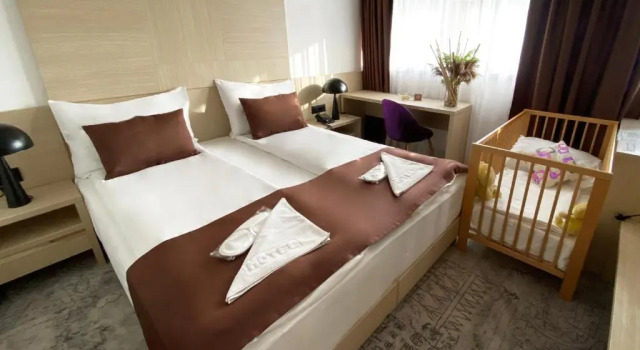Четырёхместный номер Deluxe Hotel Boss