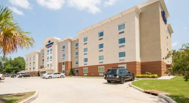 Кровать в общем номере Candlewood Suites - Baton Rouge - College Drive by IHG