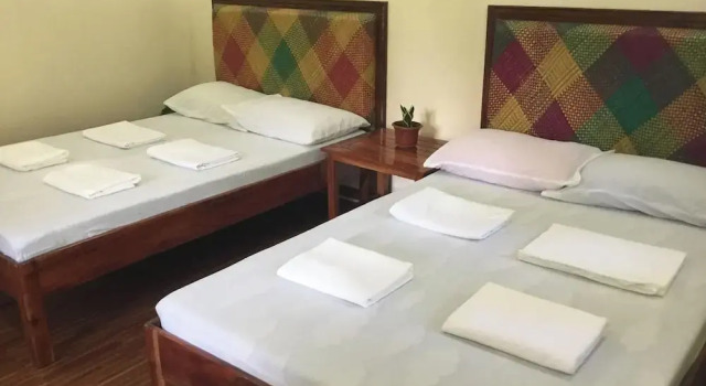 Room-camiguin Lanzones Resort Family roo, Забронировать Курортный отель Мамбахао 