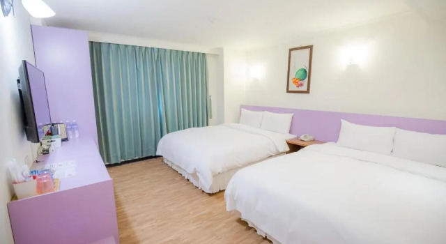 Komfortowy czteroosobowy pokój Apple Hotel