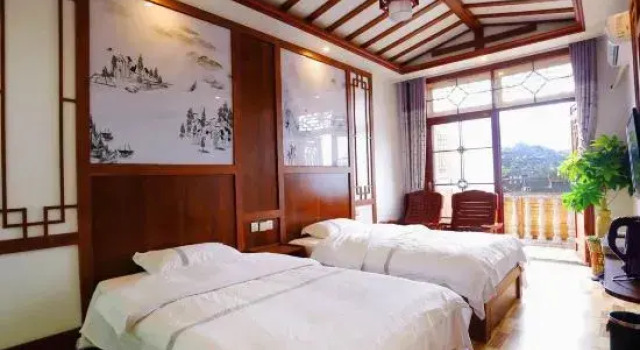 Xinyi Homeland Inn (Furong Town Waterfall Branch)