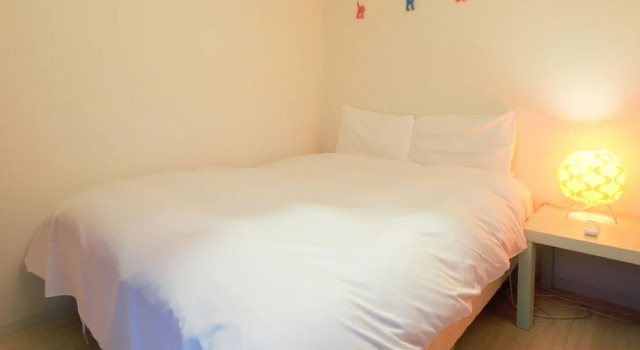 Кровать в общем номере Yokoduna Hostel