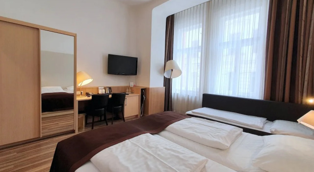 Habitación triple De ejecutivo con vista a la ciudad Hotel Zipser
