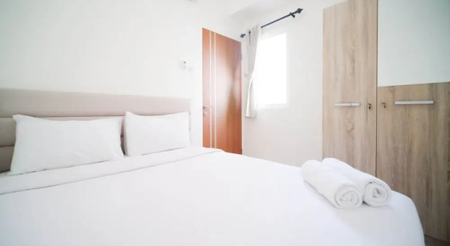 Апартаменты Cozy Living And Tidy 2Br At Puncak Dharmahusada Apartment
