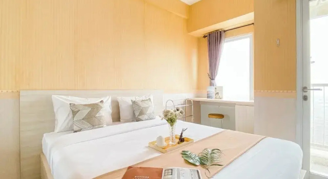 Студия Standard Relaxing Studio at Tamansari Mahogany Karawang Apartment