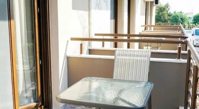Апартаменты Sinodinos Deluxe Apartments