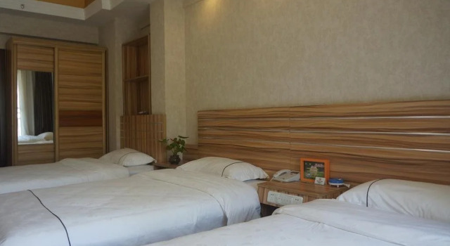 Xishuangbanna Shibao Business Hotel