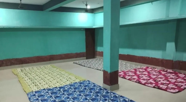 Кровать в общем номере Goroomgo Parwati Kutir Deoghar