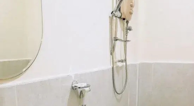 Кровать в общем номере Sunrise Garden Lake Resort